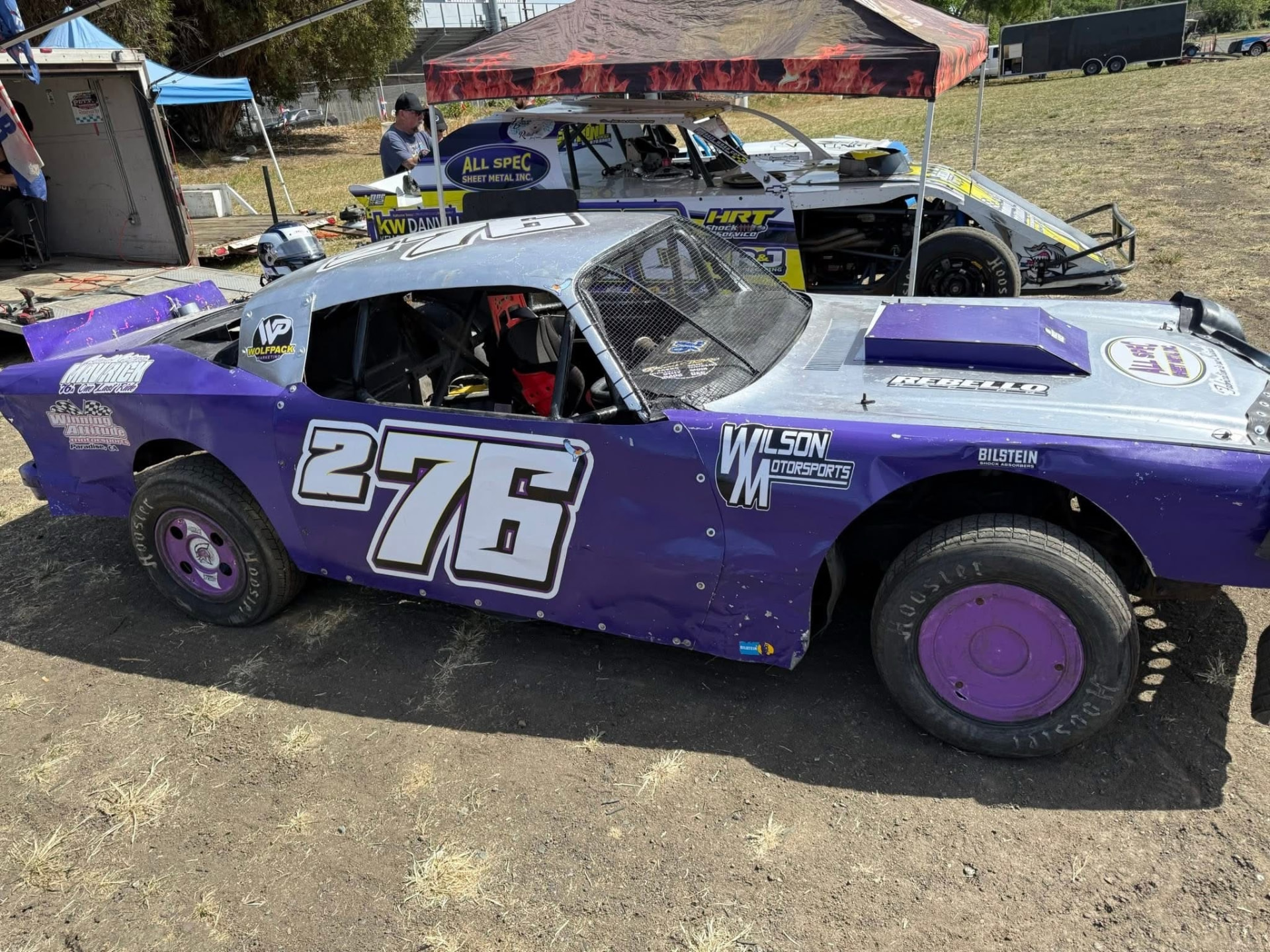 The No. 276 Hobby Stock in the pits with the Wolfpack Marketing decal on the roof rail